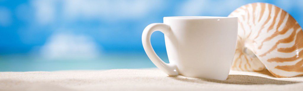 beach with coffee cup